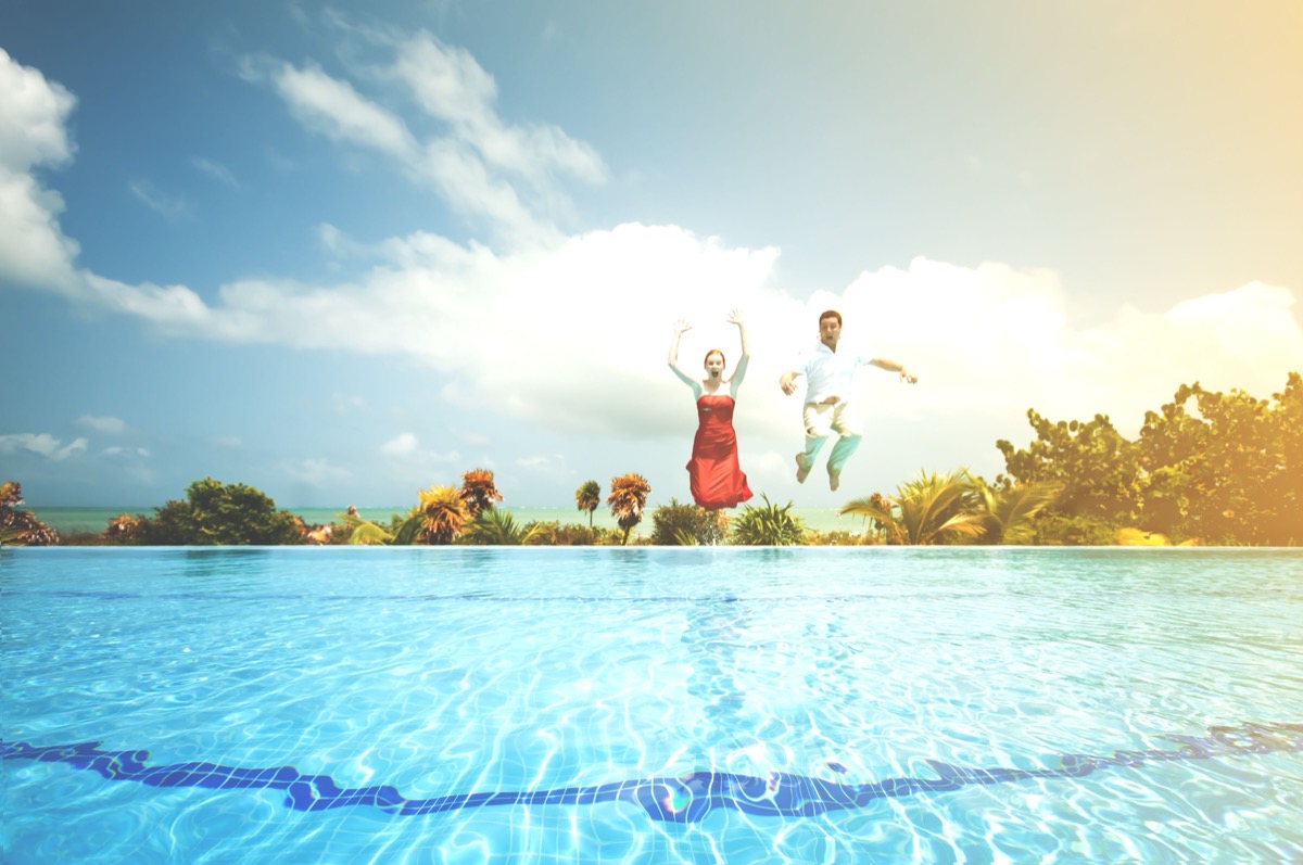 Budget-friendly beachfront resort pool with Caribbean sea view, Cancun, Mexico