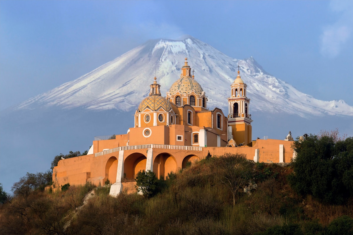 Aerial view of Great Pyramid of Cholula with cathedral, Puebla, Mexico