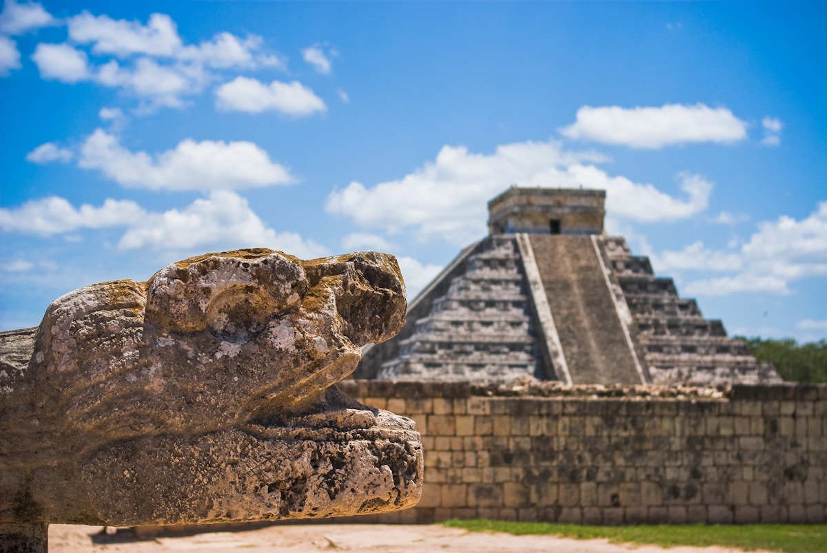 El Castillo pyramid at Chichen Itza with serpent head carving, Yucatan