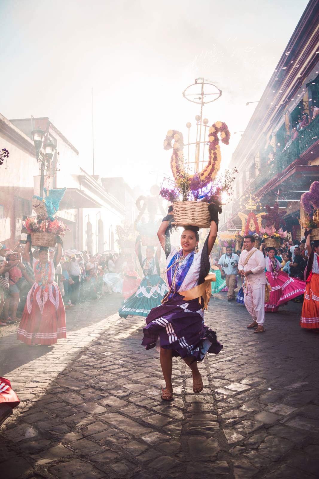 Folk dancer in a traditional dress on a Mexican street