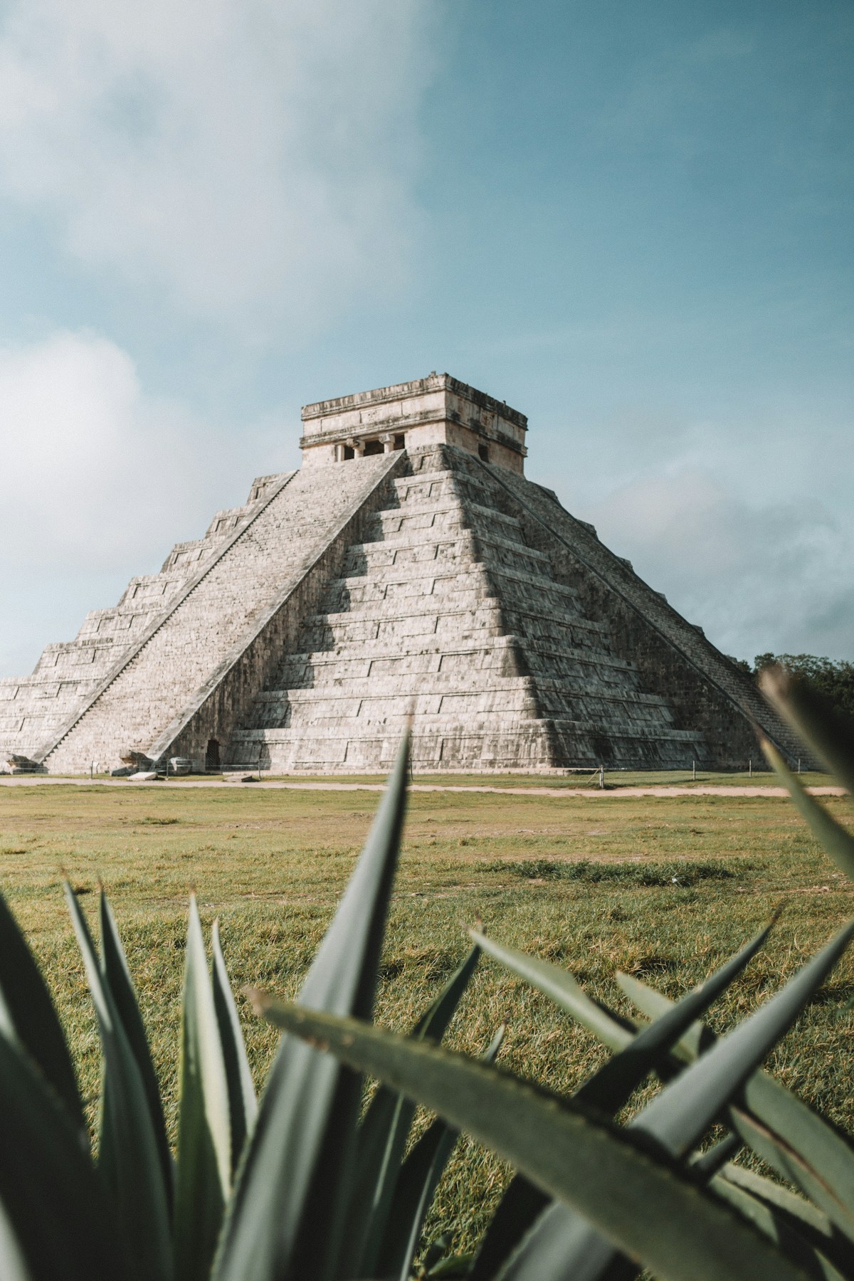Chichen Itza pyramid rising above jungle, Yucatan, Mexico